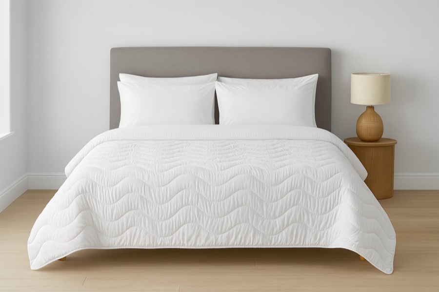 A quilted Lycoris duvet on the bed